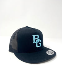 BG Cornhole Black Trucker Flat Bill Hat - Colored Embroidery - YUPOONG